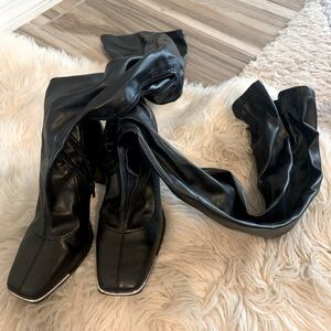 Knew high black boots